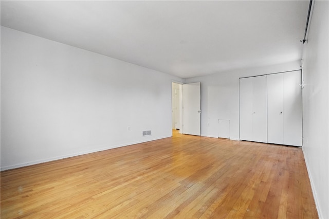 130 Shiela Dr, Green Tree, PA 15220 - unfurnished bedroom with light wood-style floors, baseboards, and a closet