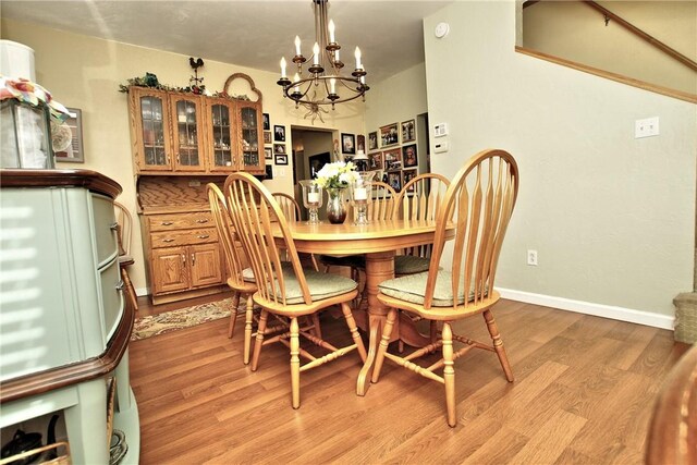 2369 Harrow Rd, Upper St Clair, PA 15241 - dining room featuring a chandelier and light wood finished floors