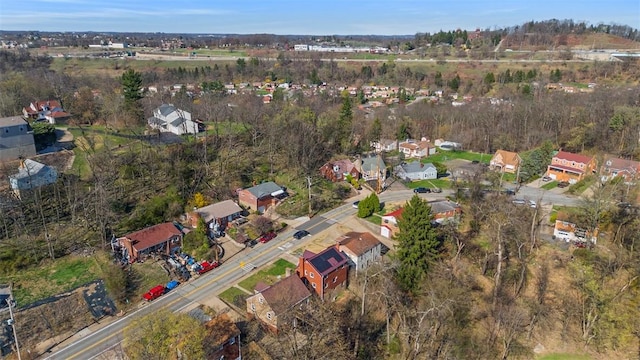 aerial view of property's location featuring nearby suburban area