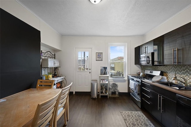 3503 Leech St Unit 3501, Lawrenceville, PA 15201 - kitchen featuring stainless steel gas range, dishwasher, a textured ceiling, dark wood-style floors, and crown molding