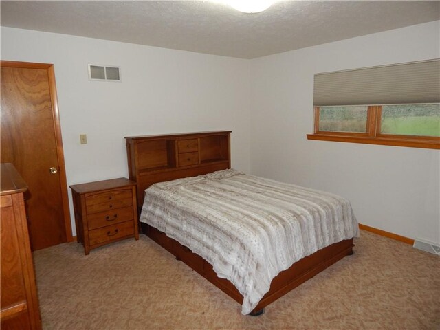 104 N Eberhart Rd, Twp Of But Nw, PA 16001 - carpeted bedroom featuring baseboards and visible vents