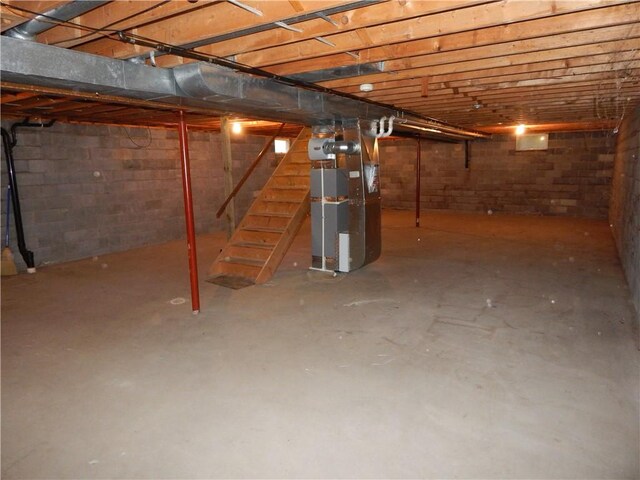 104 N Eberhart Rd, Twp Of But Nw, PA 16001 - unfinished basement with stairs and heating unit