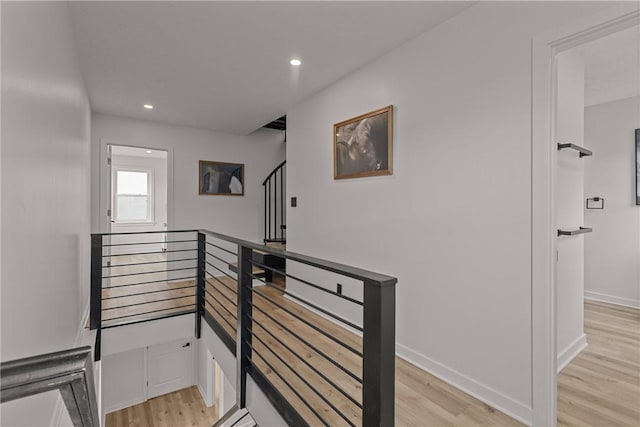1212 James St, Central North Side, PA 15212 - corridor with baseboards, recessed lighting, light wood-style flooring, and an upstairs landing
