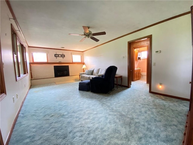 7005 N Dr, Shenango-Cra, PA 16134 - living room with crown molding, a fireplace with raised hearth, baseboards, a ceiling fan, and carpet