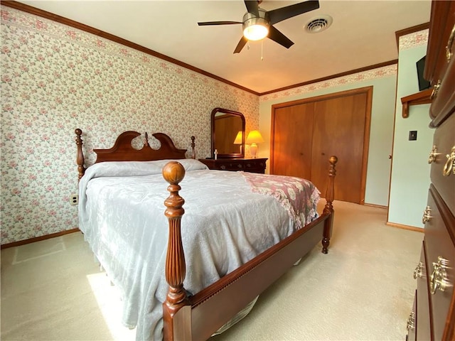 7005 N Dr, Shenango-Cra, PA 16134 - bedroom with light colored carpet, baseboards, crown molding, a closet, and wallpapered walls