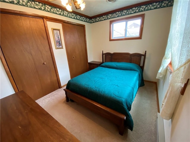 7005 N Dr, Shenango-Cra, PA 16134 - bedroom featuring carpet floors, baseboards, a closet, and a chandelier