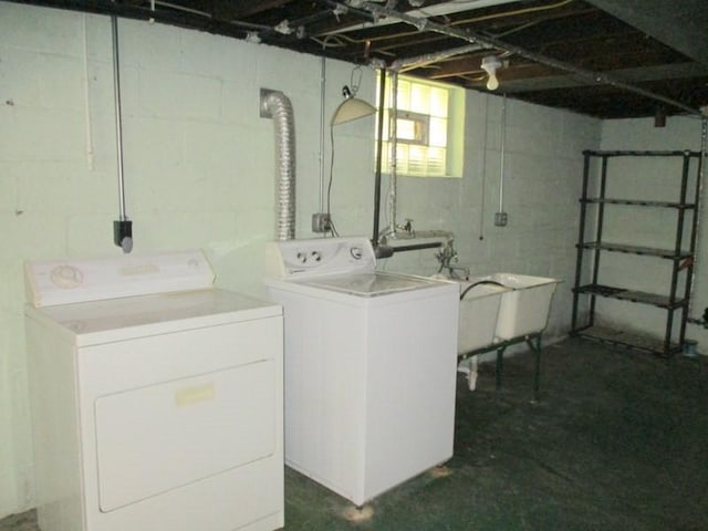 washroom with washer and dryer