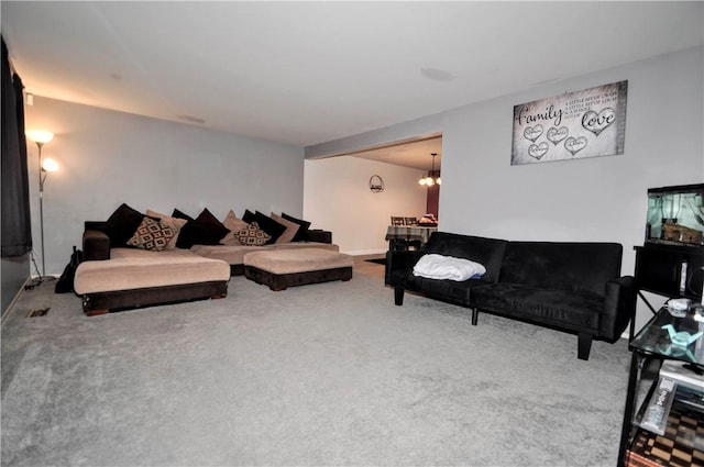 120 Scottsdale Dr, Moon/Crescent Twp, PA 15108 - carpeted living area featuring a chandelier