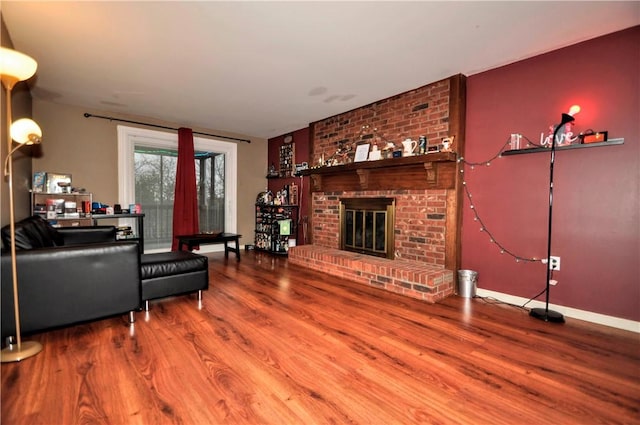 120 Scottsdale Dr, Moon/Crescent Twp, PA 15108 - living room with wood finished floors, a fireplace, and baseboards