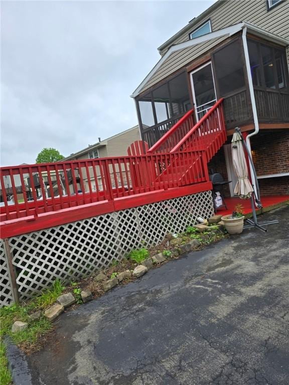 120 Scottsdale Dr, Moon/Crescent Twp, PA 15108 - view of side of property with a sunroom and a wooden deck