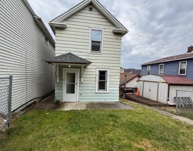 434 Melrose Ave, Ambridge, PA 15003 - rear view of house with a storage shed