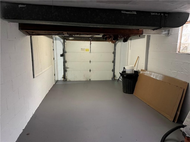 garage featuring concrete block wall