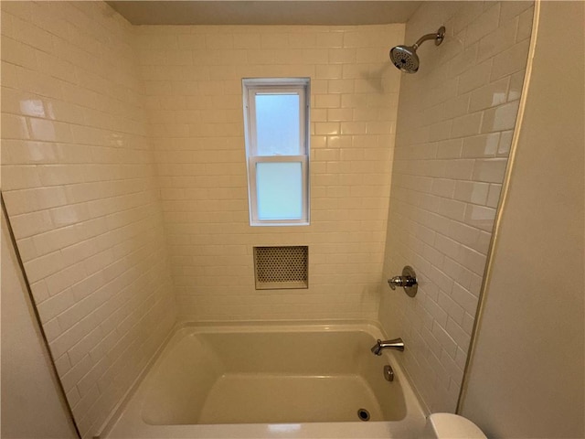 full bath featuring washtub / shower combination