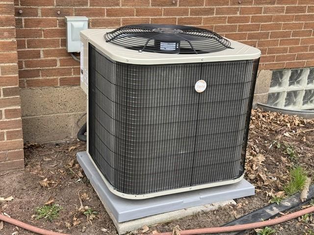 details with brick siding and cooling unit
