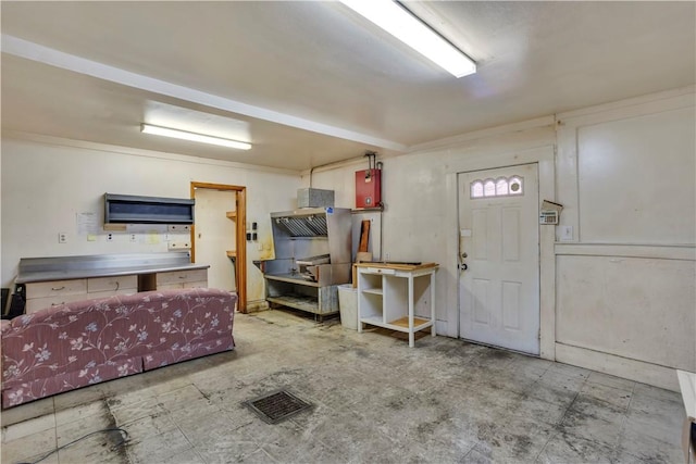 basement with tile patterned floors and visible vents