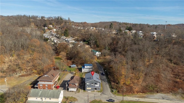 aerial view with a wooded view