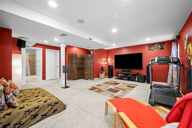 living area featuring carpet flooring, recessed lighting, and visible vents