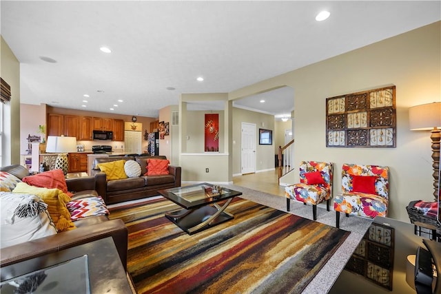 living room with recessed lighting and stairway