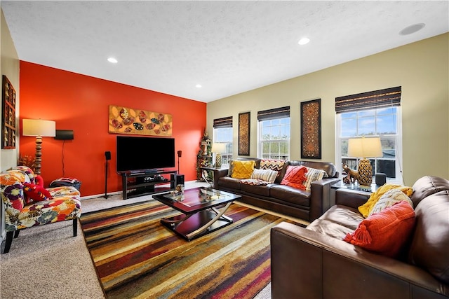 carpeted living room with recessed lighting