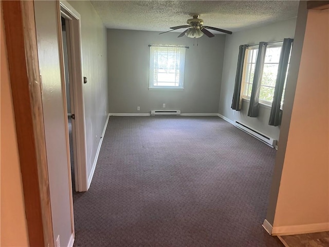 55 Evergreen, West Salem Twp, PA 16125 - unfurnished room featuring a baseboard heating unit, a textured ceiling, carpet floors, and a ceiling fan