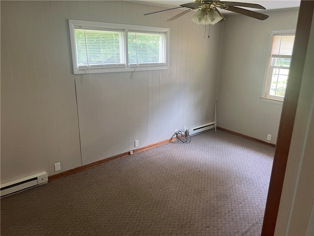 55 Evergreen, West Salem Twp, PA 16125 - empty room with a baseboard heating unit, ceiling fan, and carpet floors