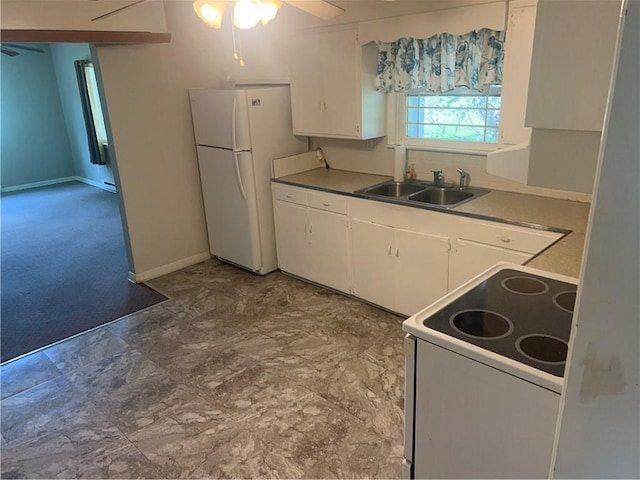 55 Evergreen, West Salem Twp, PA 16125 - kitchen with white appliances, ceiling fan, white cabinets, light countertops, and carpet flooring