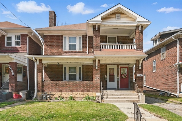 7447 Schoyer Ave, Swissvale, PA 15218 - view of front of property with a balcony, a chimney, a porch, and brick siding