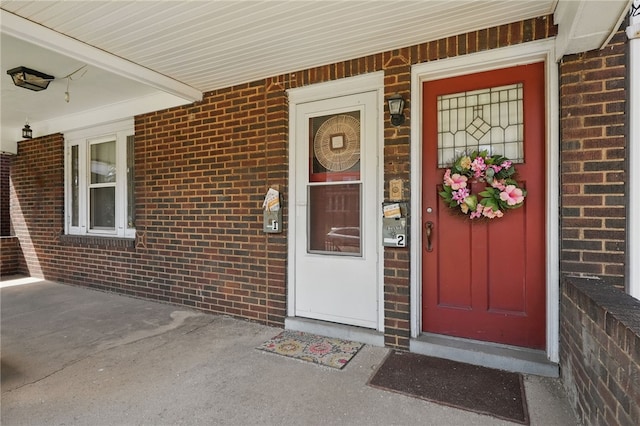 7447 Schoyer Ave, Swissvale, PA 15218 - property entrance featuring brick siding and a porch