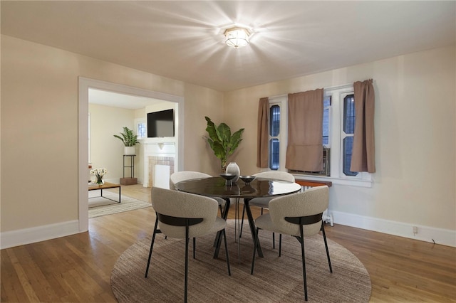 7447 Schoyer Ave, Swissvale, PA 15218 - dining room featuring baseboards and wood finished floors