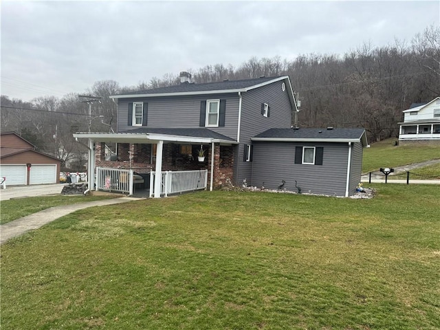 966 Fayette City Rd, Fayette City, PA 15438 - traditional home featuring a garage, brick siding, a porch, and a front lawn