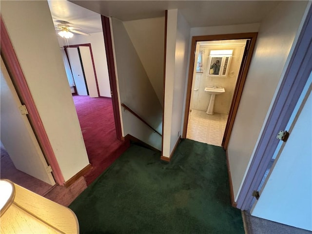 966 Fayette City Rd, Fayette City, PA 15438 - hall featuring dark carpet, baseboards, and an upstairs landing