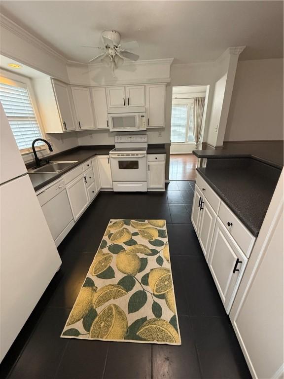 5 Trotwood Cir, North Strabane, PA 15317 - kitchen featuring white appliances, a sink, dark tile patterned flooring, dark countertops, and white cabinetry