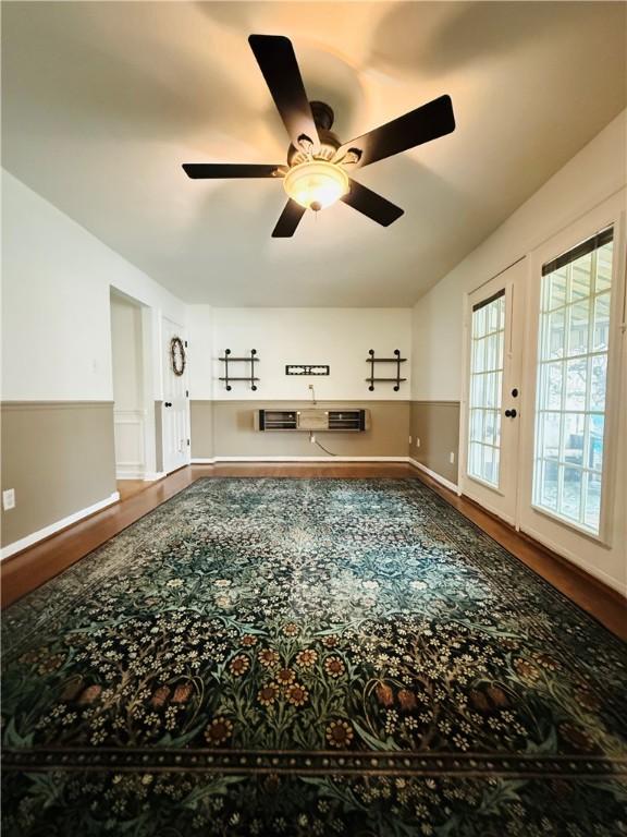 5 Trotwood Cir, North Strabane, PA 15317 - spare room featuring wood finished floors, ceiling fan, baseboards, and french doors