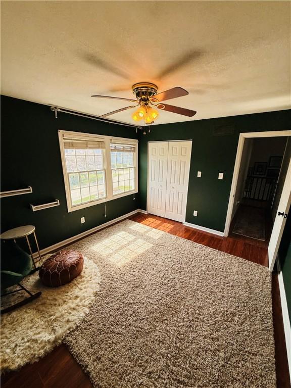 5 Trotwood Cir, North Strabane, PA 15317 - bedroom featuring wood finished floors, baseboards, a closet, and ceiling fan