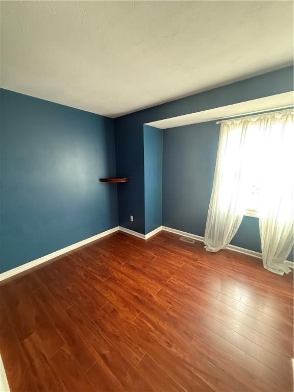 5 Trotwood Cir, North Strabane, PA 15317 - empty room featuring wood finished floors and baseboards