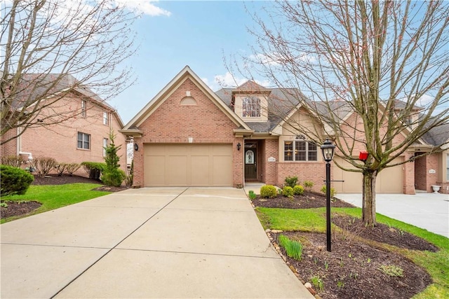 1728 Waterleaf Dr, Franklin Park, PA 15143 - view of front of property featuring brick siding, an attached garage, and driveway