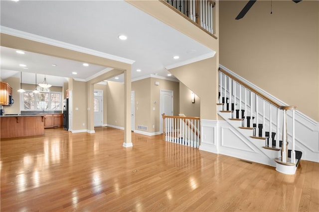 1728 Waterleaf Dr, Franklin Park, PA 15143 - unfurnished living room featuring recessed lighting, light wood-style flooring, and a decorative wall
