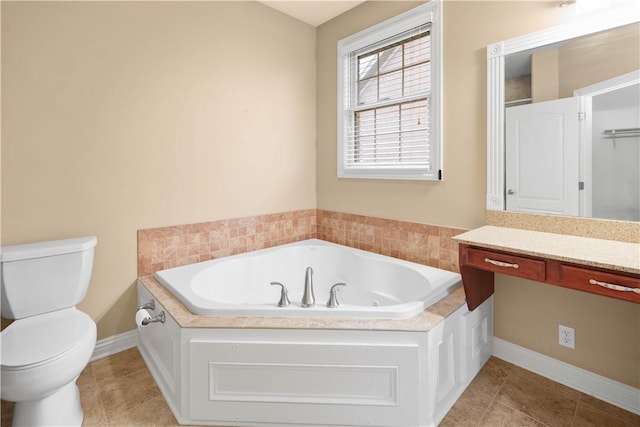 1728 Waterleaf Dr, Franklin Park, PA 15143 - full bathroom featuring a jetted tub, vanity, baseboards, tile patterned flooring, and toilet
