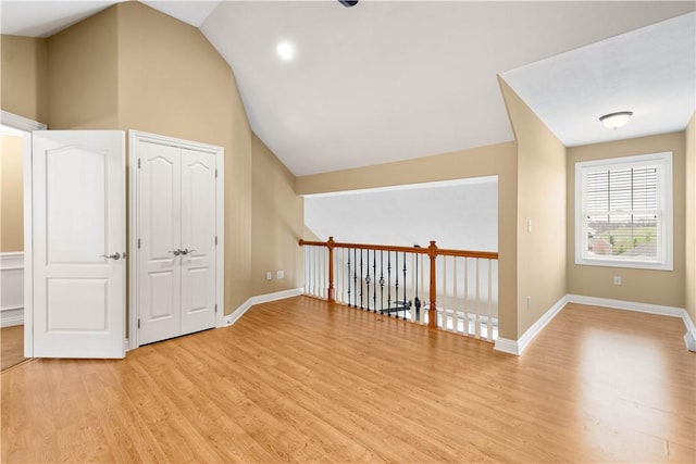 1728 Waterleaf Dr, Franklin Park, PA 15143 - bonus room with light wood finished floors, baseboards, and vaulted ceiling