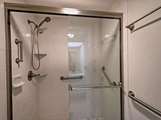 bathroom featuring a stall shower