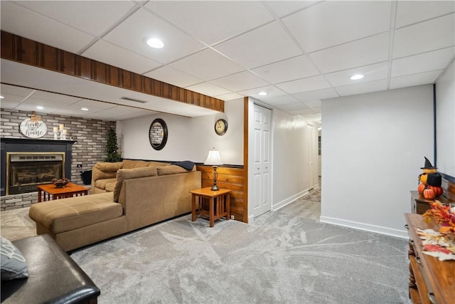 living room with visible vents, a paneled ceiling, a fireplace, recessed lighting, and carpet flooring
