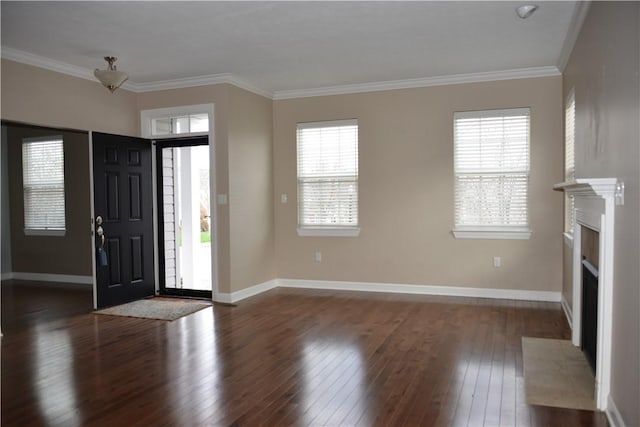 395 Wealdstone Rd, Cranberry Twp, PA 16066 - entryway featuring dark wood-type flooring, ornamental molding, and a fireplace with flush hearth
