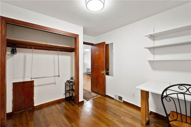 63 Lawn St, Oakland, PA 15213 - unfurnished bedroom with a closet, baseboards, dark wood finished floors, and visible vents