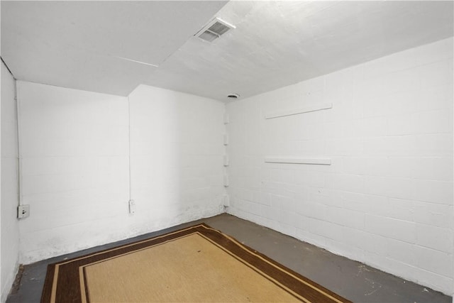63 Lawn St, Oakland, PA 15213 - unfurnished room featuring concrete floors, visible vents, and concrete block wall