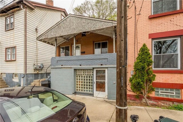 63 Lawn St, Oakland, PA 15213 - view of property exterior featuring brick siding