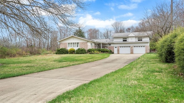 view of front of home with brick siding, driveway, an attached garage, and a front lawn