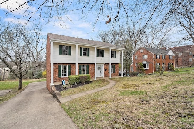 4726 W Barlind Dr, Whitehall, PA 15227 - view of front of house with brick siding and a front lawn