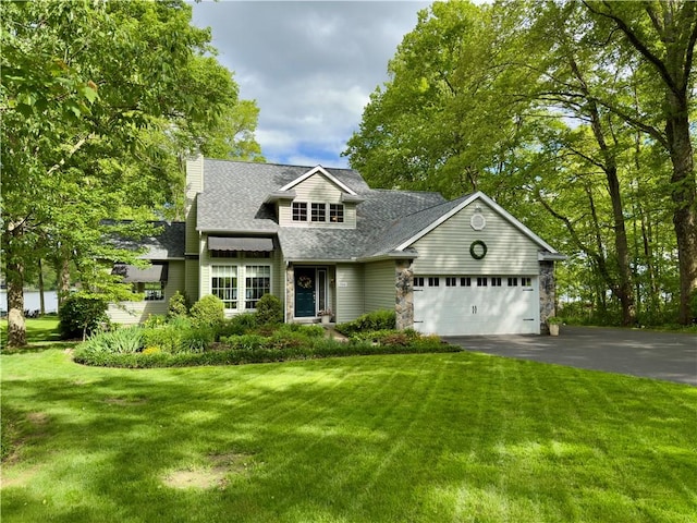 788 Latonka Dr, Coolspring Twp, PA 16137 - view of front of house with driveway, an attached garage, a front yard, a chimney, and a shingled roof