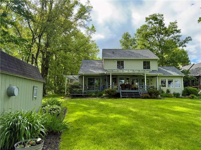 788 Latonka Dr, Coolspring Twp, PA 16137 - back of house featuring a lawn, a ceiling fan, and roof with shingles