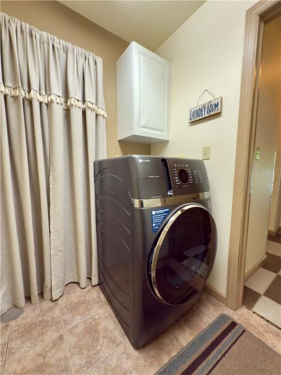 788 Latonka Dr, Coolspring Twp, PA 16137 - laundry area with washer / clothes dryer and cabinet space